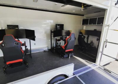 archangel racing simulator trailer setup with three rigs